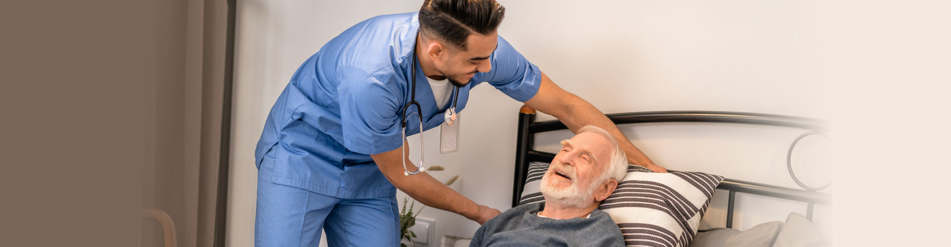 nurse helping the elder to sleep