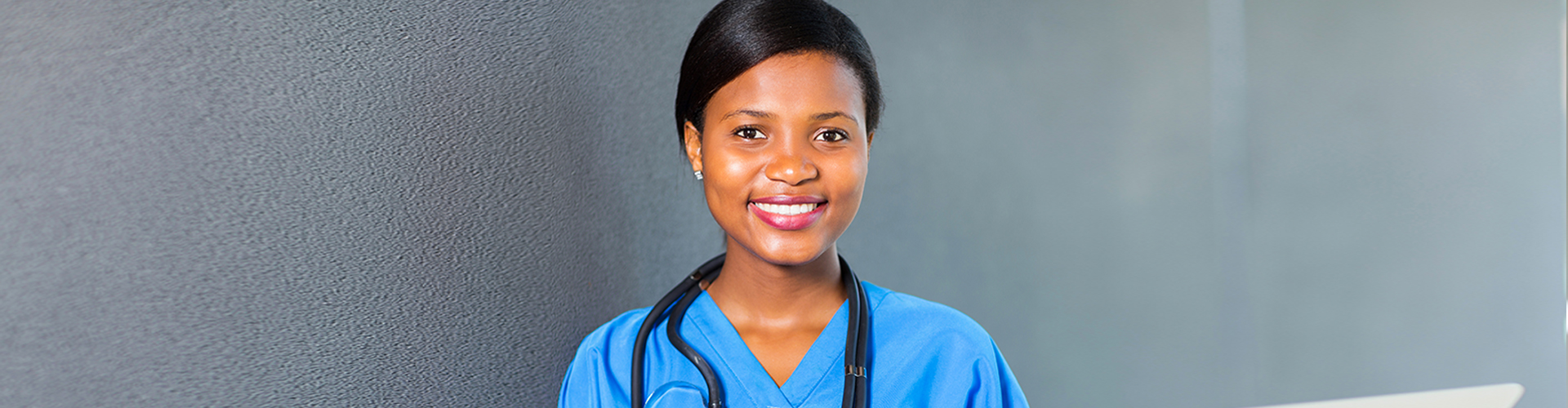 medical personnel smiling at the camera